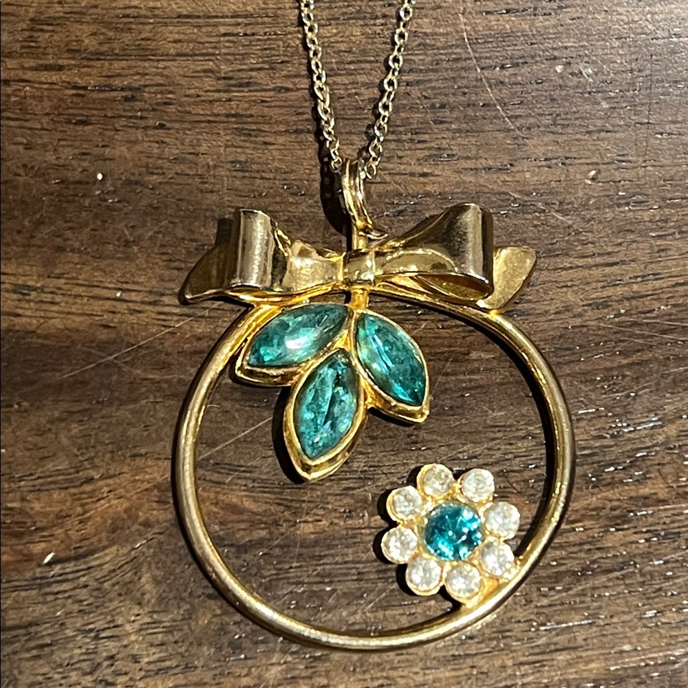 Gold toned Necklace Circle Pendant Bow Flower Green Gems